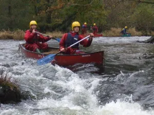 canoe_on_rapid
